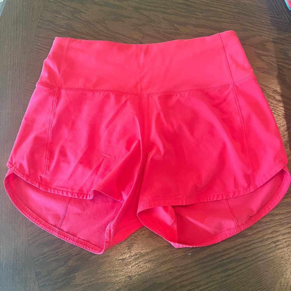 Pink Lululemon size 4 - 4” shorts